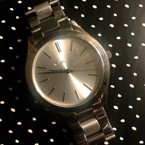 Women’s silver Michael Kors watch